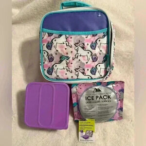 Girls Unicorn & Stars insulated zippered lunch box with handle for carrying.